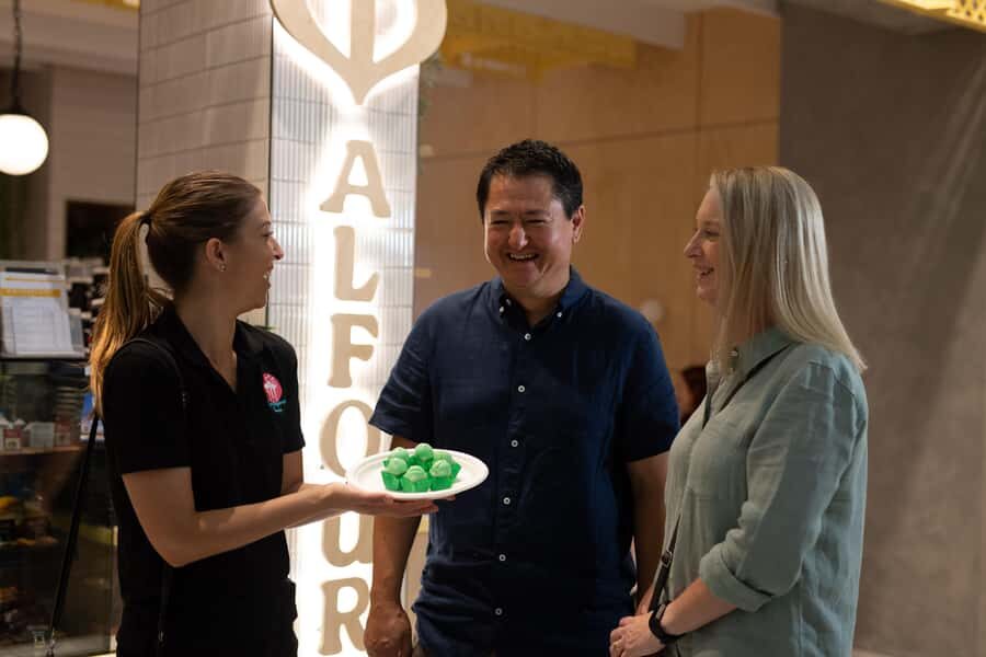 Adelaide: Local Food Tour and Tastings with Guide - Entering Haigh’s Chocolates Inside Adelaide Arcade