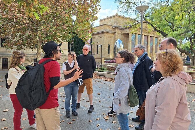 Discover Adelaide City Walk and Popeye River Cruise - North Terrace and Parliament: statues, pioneers, and how reforms show up in buildings